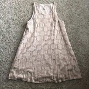 Cream tank mini dress with circle detail. Size L.